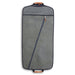 Grey garment bag with a diagonal zipper and two leather-wrapped handles on top and bottom.