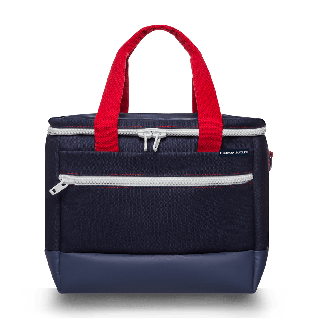 Navy medium cooler bag with a front and top zipper and red handles.